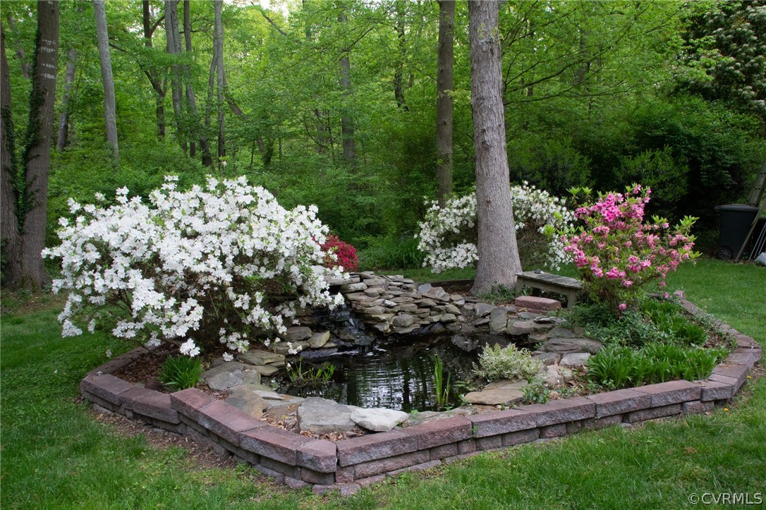 504 Rivers Bend Circle Chester, VA 23836 - Photo 38 of 50 front view of a house with a yard and potted plants