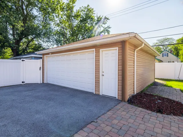 a view of a backyard of the house