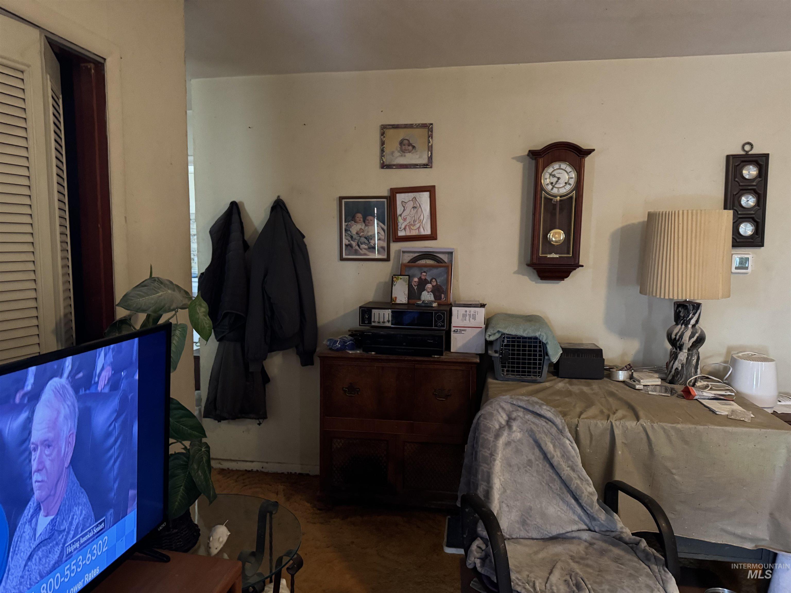 416 North 2nd Street Nyssa, OR 97913 - Photo 19 of 24 Bedroom featuring carpet and baseboards