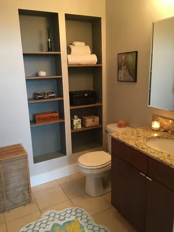 a view of hallway with walk in closet