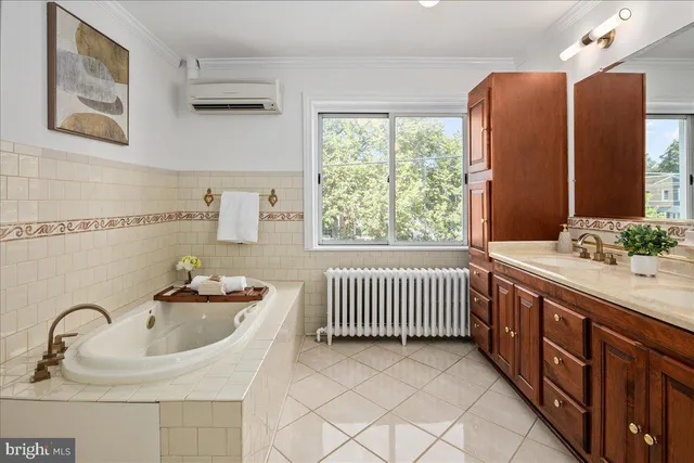 a bathroom with a sink and a large mirror