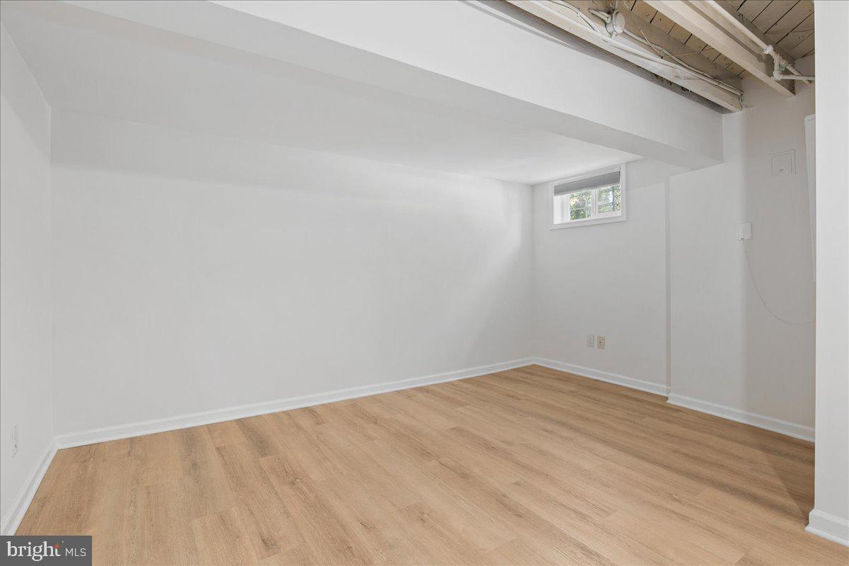 6411 7th Street Northwest Washington, DC 20012 - Photo 26 of 35 an empty room with a workbench