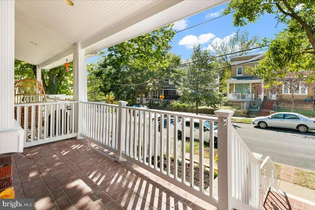 a view of a two chairs in the porch