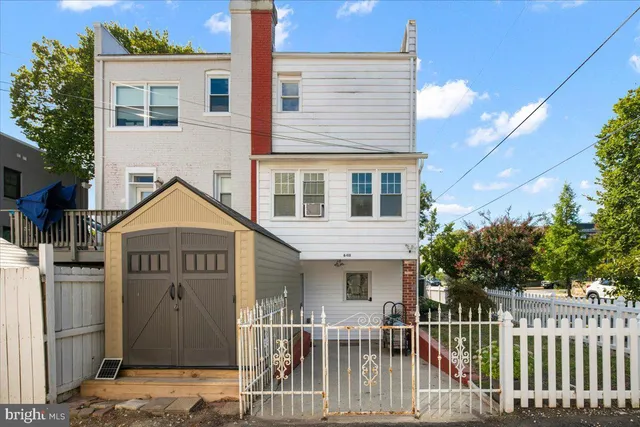 a front view of a house with a porch
