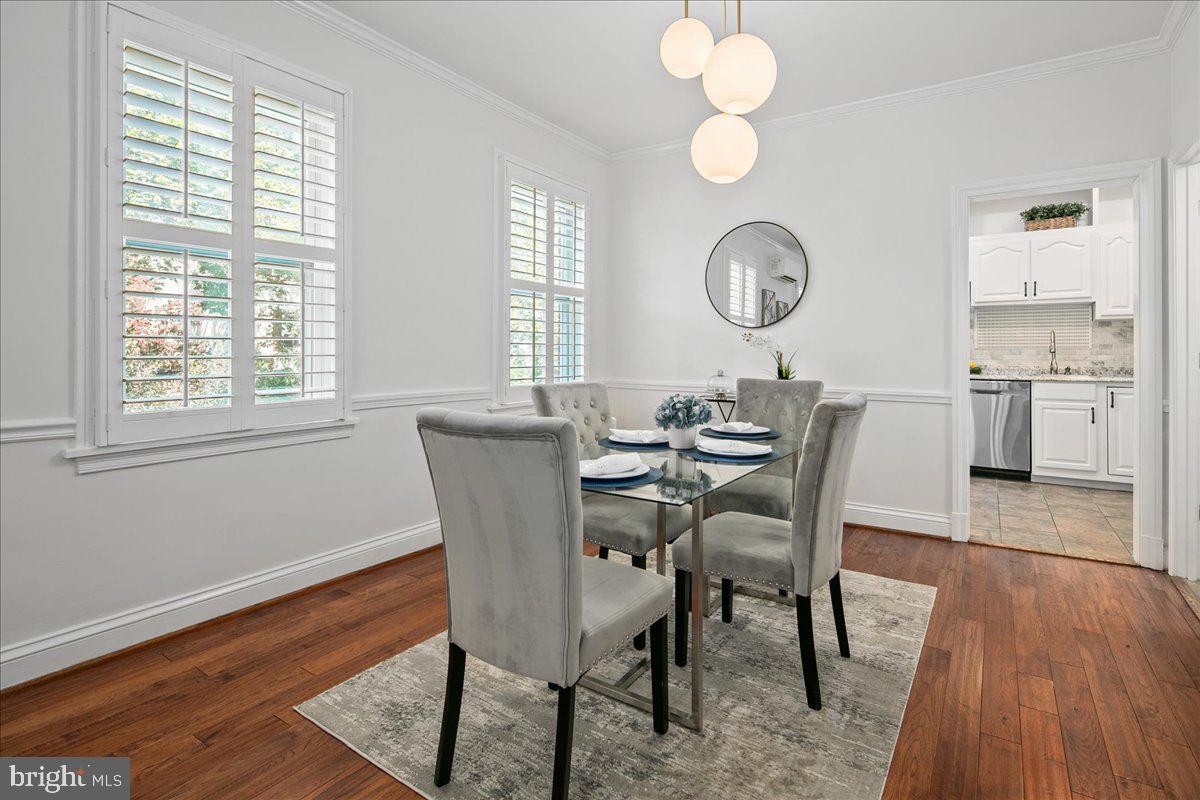 6411 7th Street Northwest Washington, DC 20012 - Photo 9 of 35 a view of a dining room with furniture window and wooden floor