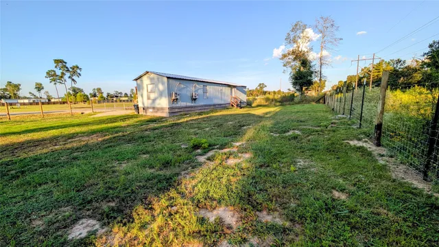 a view of a swimming pool and an outdoor space