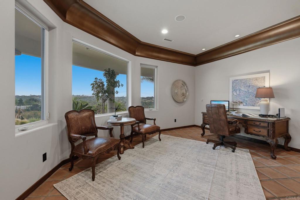 3244 Olivenhain Farms Road Encinitas, CA 92024 - Photo 23 of 47 a living room with furniture and a window