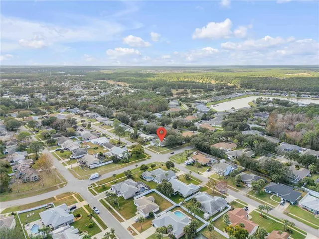 an aerial view of residential building with parking space