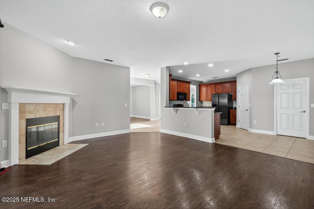 612 Spruce Creek Road St. Johns, FL 32259 - Photo 15 of 50 a view of kitchen with a sink and a stove top oven