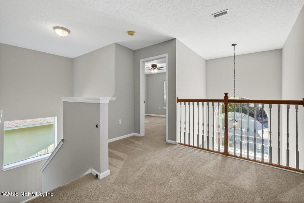 612 Spruce Creek Road St. Johns, FL 32259 - Photo 28 of 50 a view of a hallway