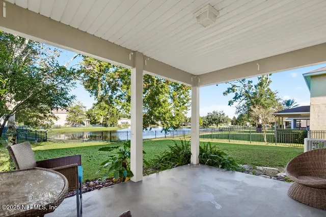 a view of a patio with backyard