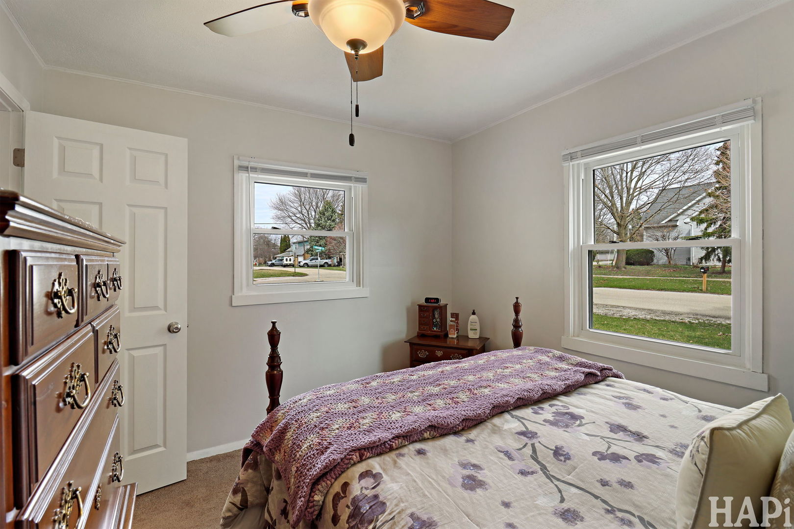 804 Elm Street Maple Park, IL 60151 - Photo 14 of 31 a bedroom with a bed and a painting on the wall
