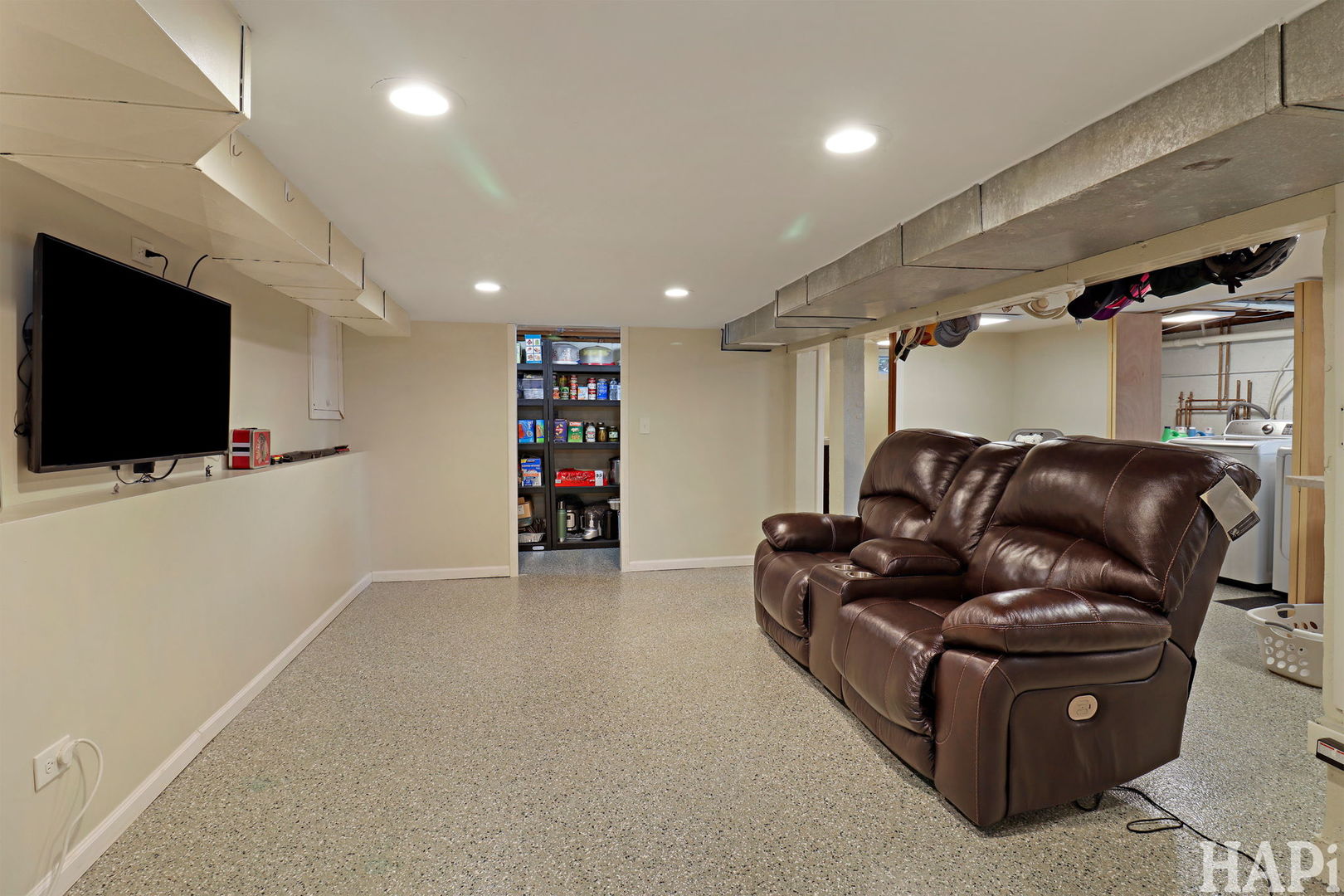 804 Elm Street Maple Park, IL 60151 - Photo 21 of 31 a living room with furniture and a flat screen tv
