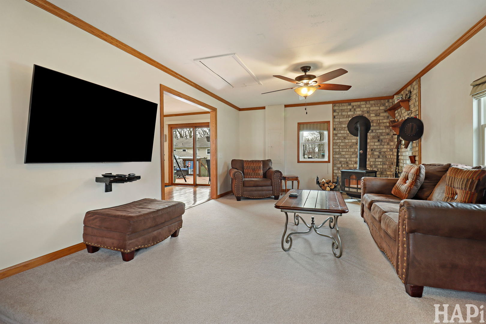 804 Elm Street Maple Park, IL 60151 - Photo 3 of 31 a living room with furniture and a flat screen tv