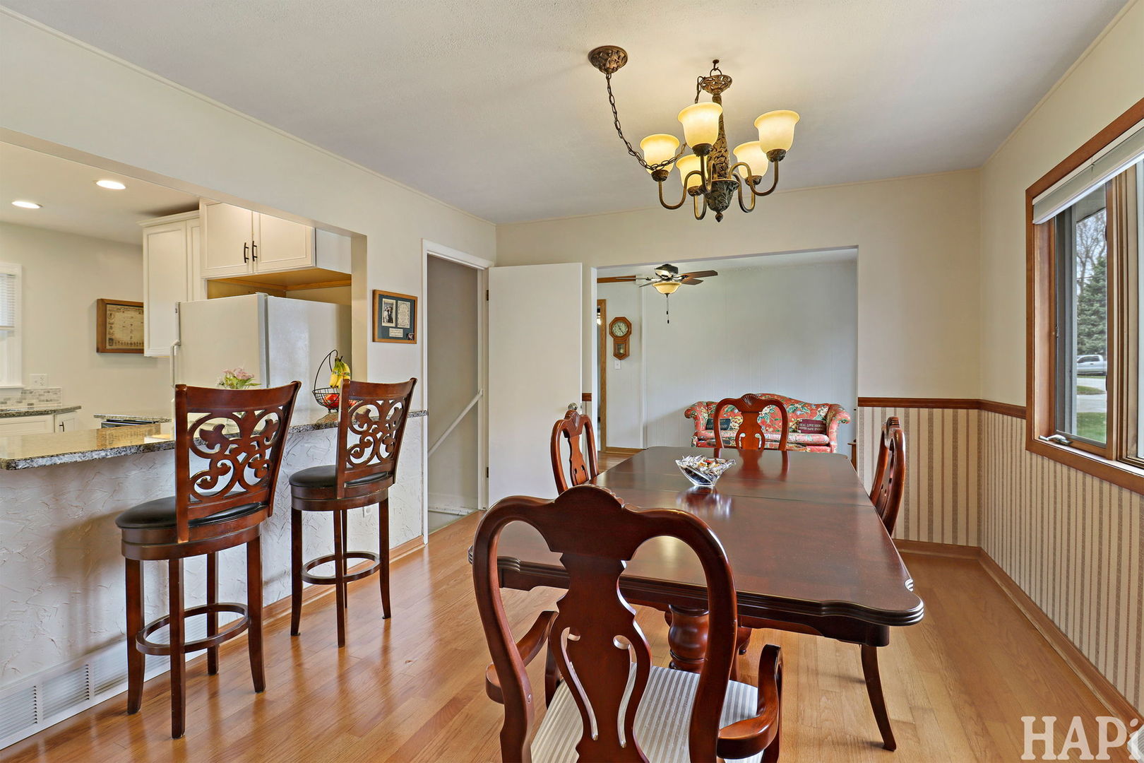 804 Elm Street Maple Park, IL 60151 - Photo 9 of 31 a view of a dining room with furniture and chandelier