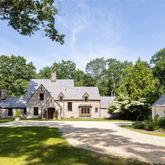 front view of a house with a big yard