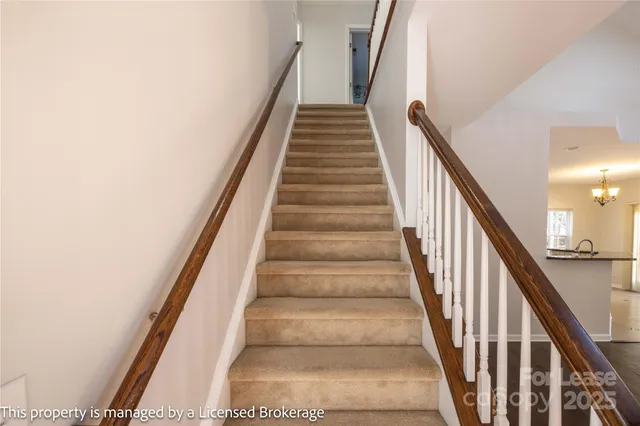 a view of a hallway with entryway