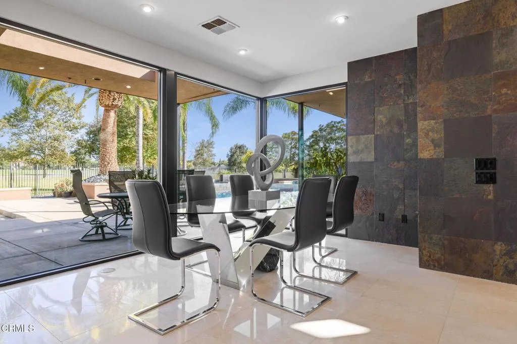 2406 Windermere Street Bakersfield, CA 93311 - Photo 30 of 75 a view of a dining room with furniture window and outside view