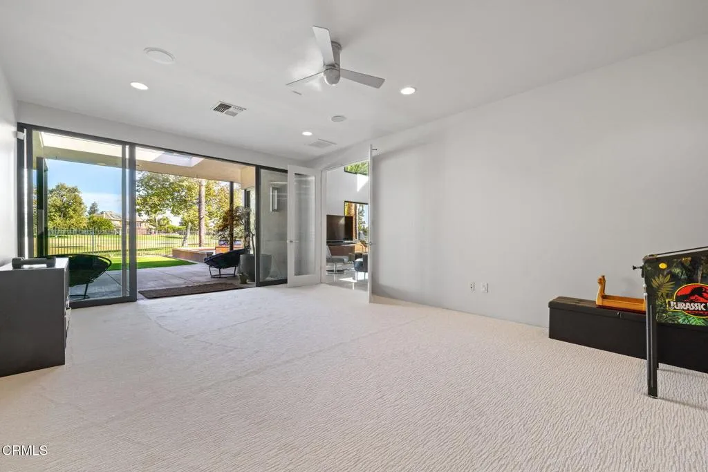 2406 Windermere Street Bakersfield, CA 93311 - Photo 32 of 75 a view of an empty room with a balcony