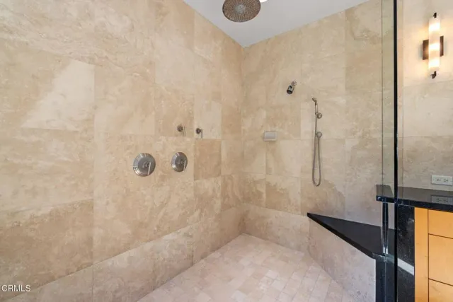 a swimming pool with outdoor seating and yard