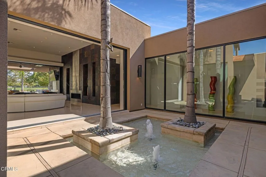 2406 Windermere Street Bakersfield, CA 93311 - Photo 5 of 75 a living room with couch and large windows
