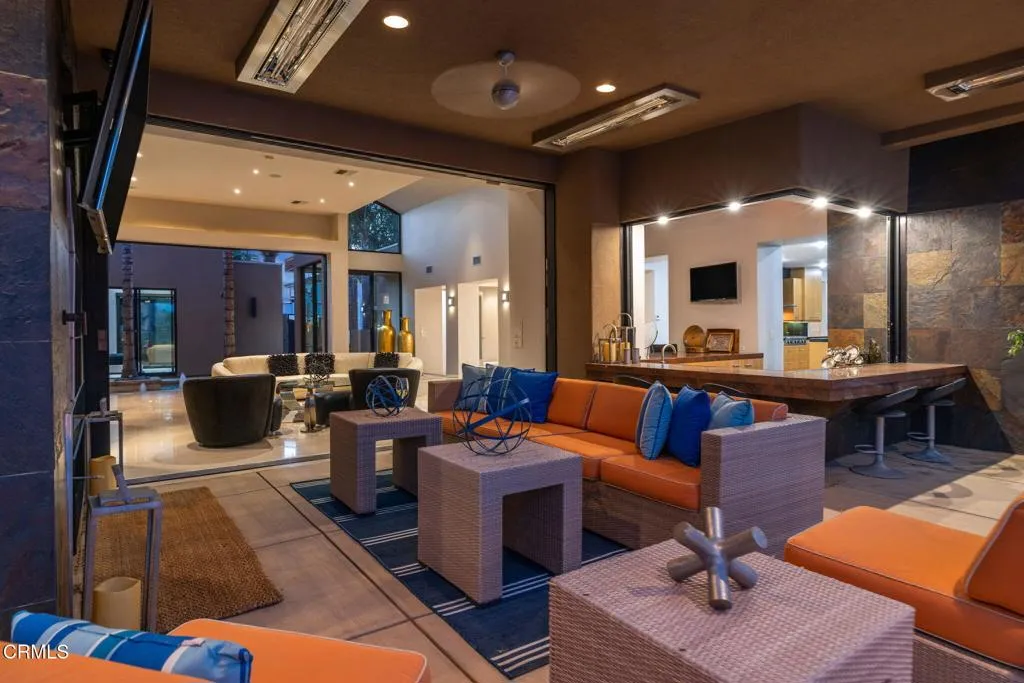 2406 Windermere Street Bakersfield, CA 93311 - Photo 68 of 75 a living room with furniture kitchen view and a large window