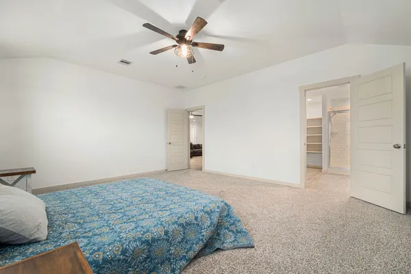 a view of livingroom with hardwood floor and a ceiling fan