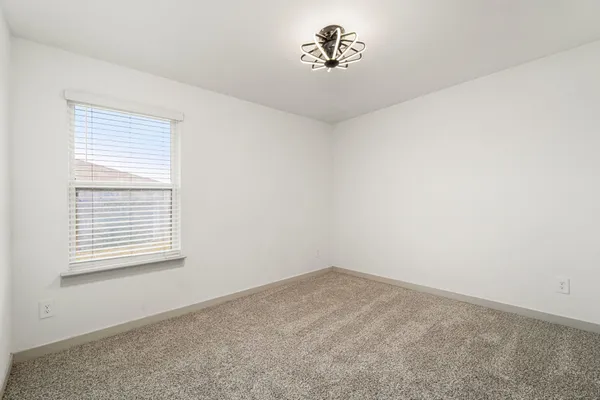 a view of a room with a window