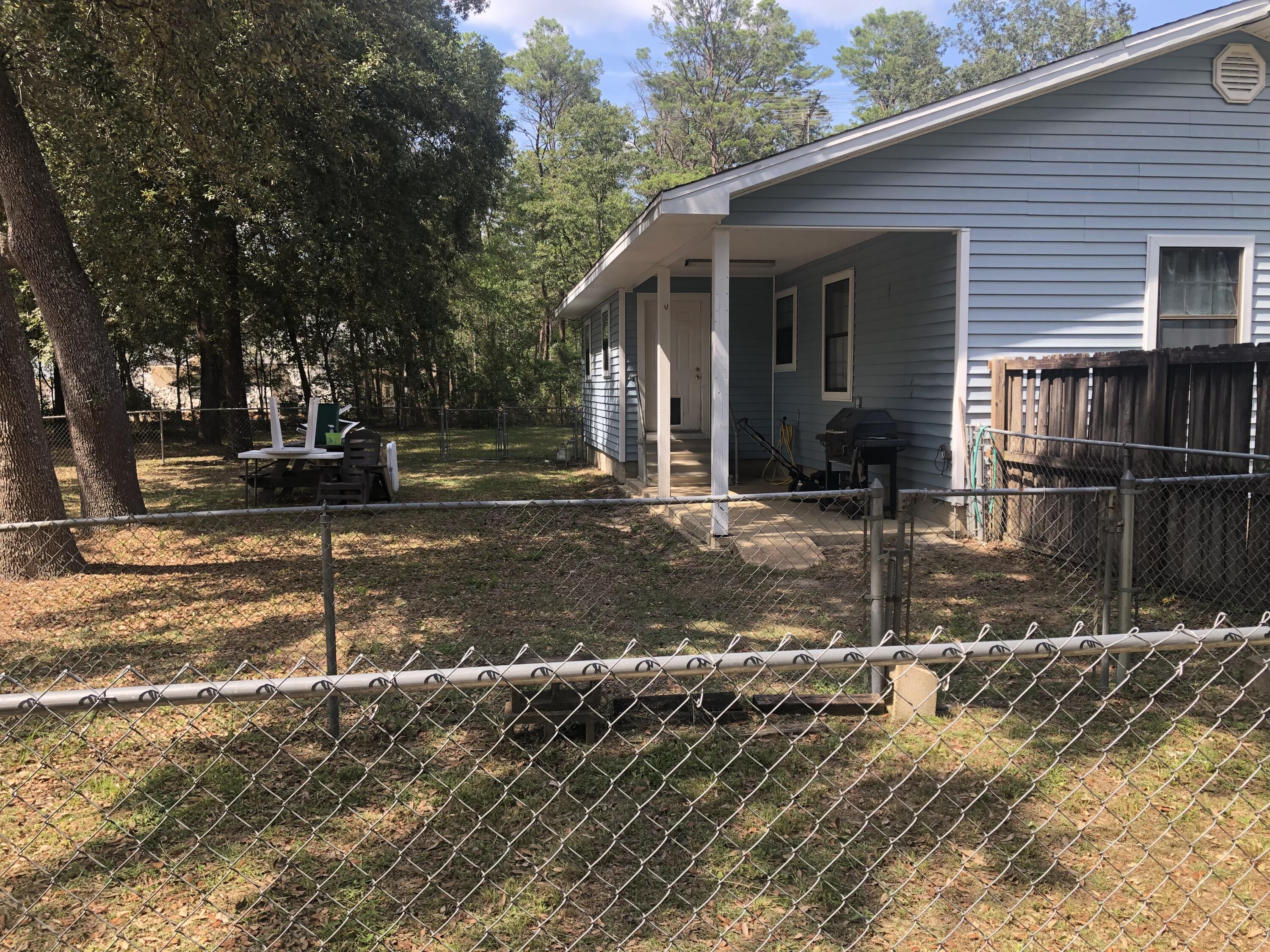 261 Roberts Road DeFuniak Springs, FL 32433 - Photo 3 of 18 a view of a house with street