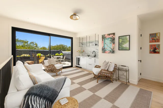 a view of a patio with furniture