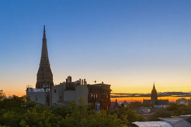 a view of a city with tall buildings