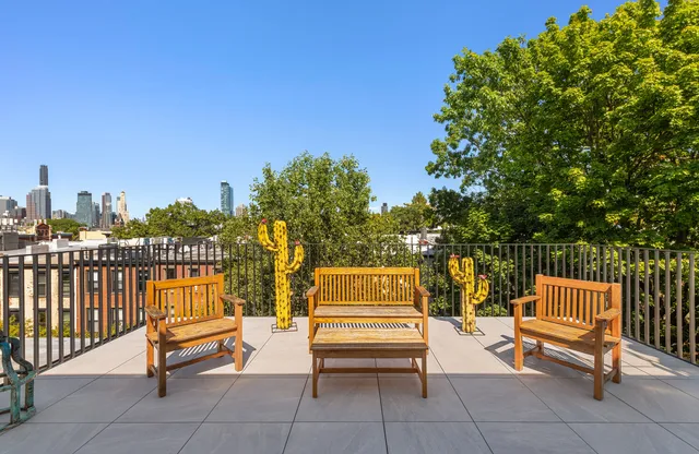 a view of a city with tall buildings