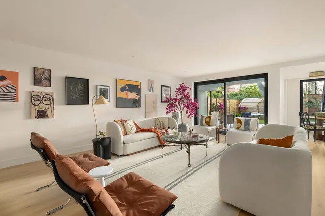 a dining room with furniture and window
