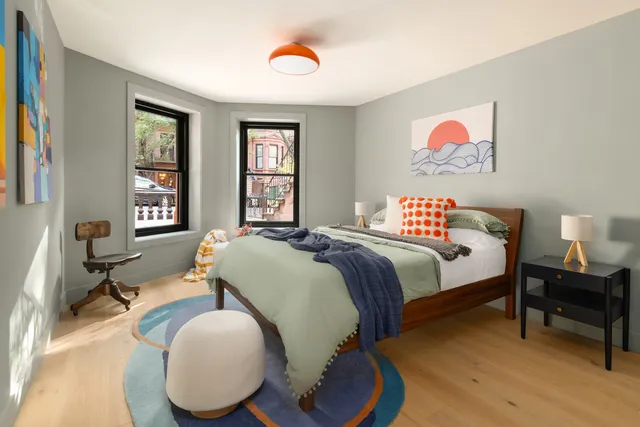 a view of a backyard with sitting area