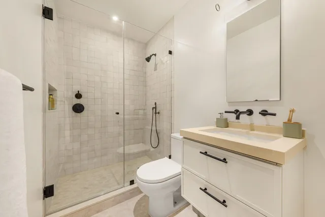 a view of a building with sitting area