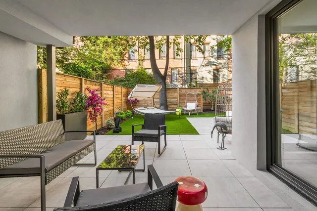 a living room with furniture and a table