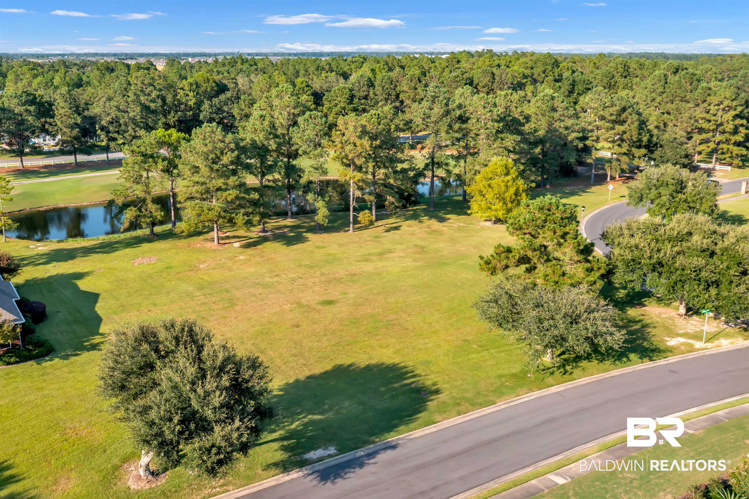 Lakes Circle Gulf Shores, AL 36542 - Photo 15 of 15 Drone / aerial view of a nearby body of water