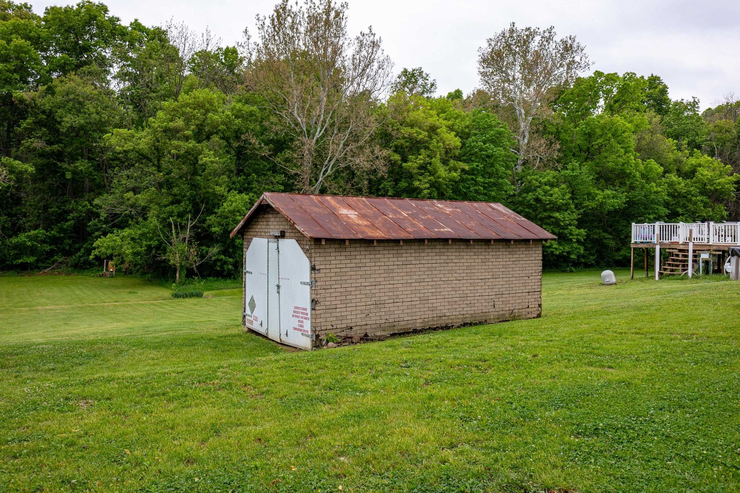 13896 Rockingham Pike Elkton, VA 22827 - Photo 6 of 60 a view of a tiny house with a yard