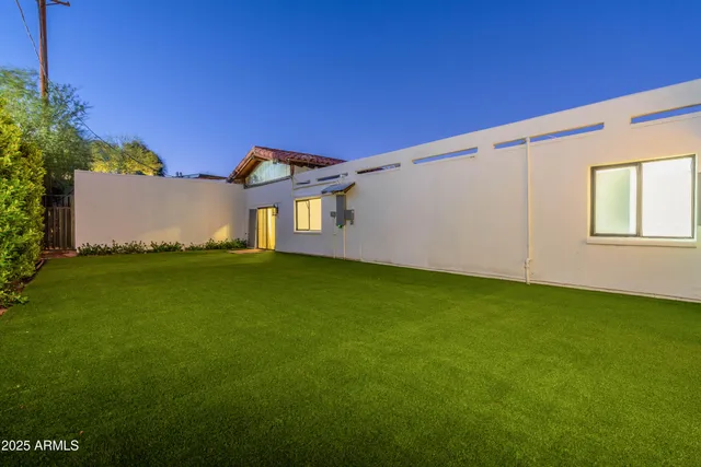 a room with furniture pool table and a rug
