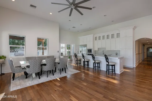 a bathroom with a shower and a mirror
