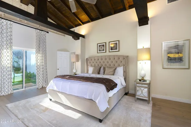 a view of a hallway view with wooden floor