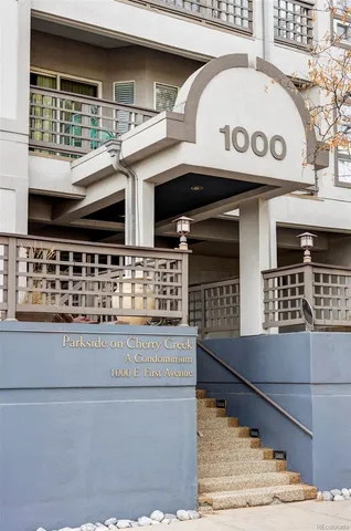 a kitchen with stainless steel appliances granite countertop a stove and cabinets