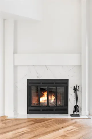 a living room with a fireplace