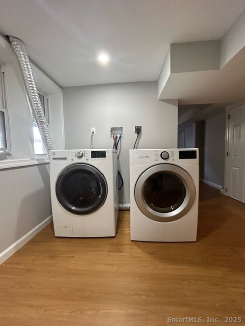 755 Old Town Road Bridgeport, CT 06606 - Photo 17 of 17 a view of a kitchen with a washer and dryer