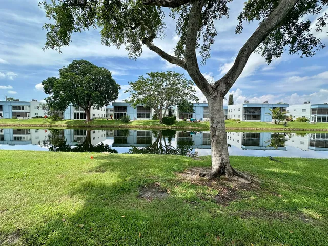 a view of front door with wooden floor
