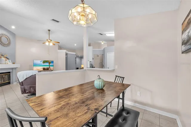 a view of kitchen and dining area with furniture