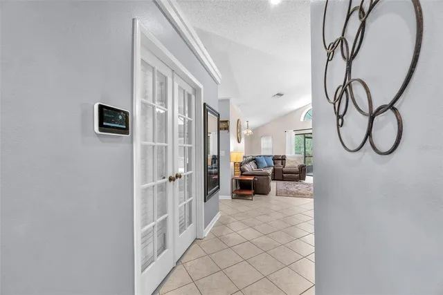 a view of a livingroom with furniture and entryway