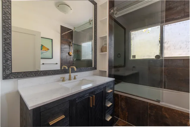 a bed room with a bed and a window