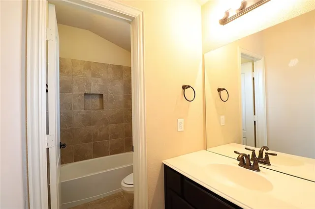 a front view of a house with garage