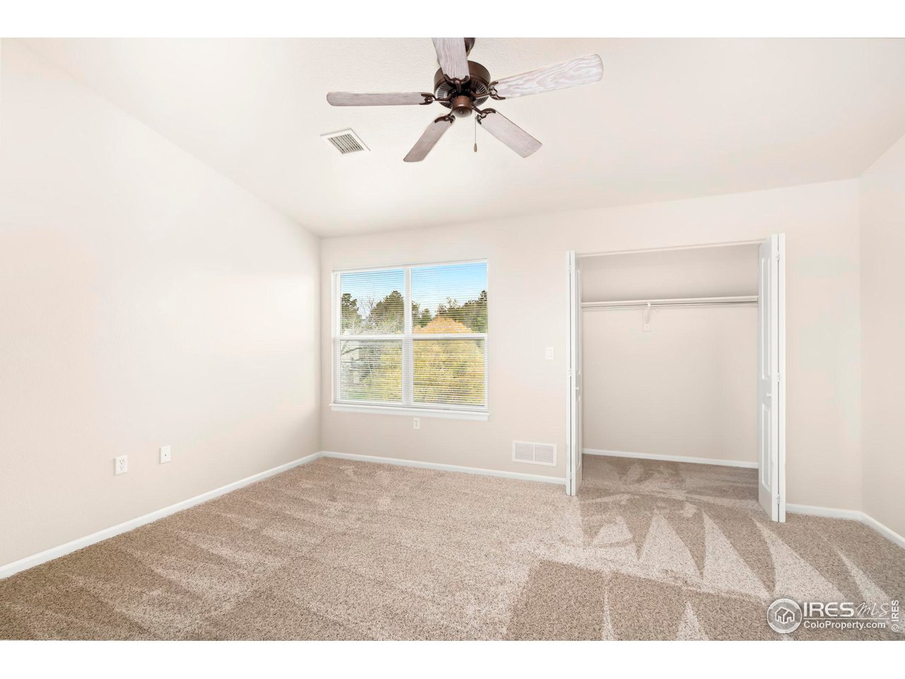1221 East Prospect Road, Unit 5 Fort Collins, CO 80525 - Photo 20 of 38 Large Primary Bedroom w/New Carpet